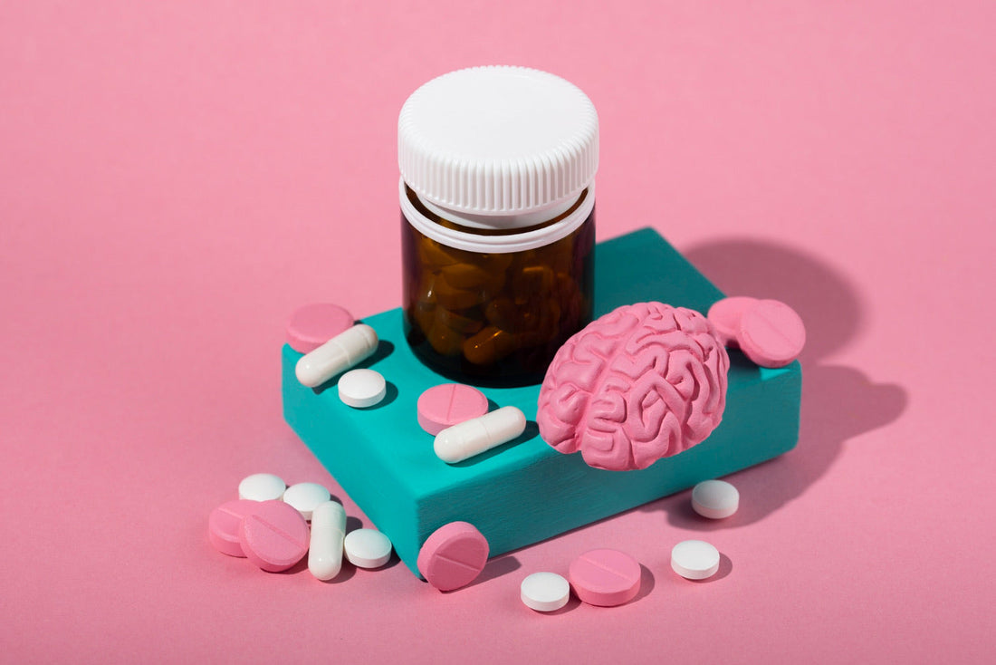 Nootropics i burk och utanför mot rosa bakgrund
