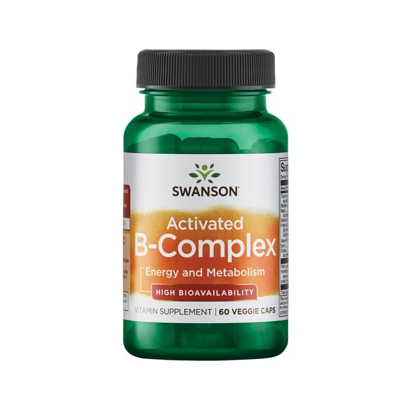 Grön vitamintillskottsflaska med svart skruvlock och etikett